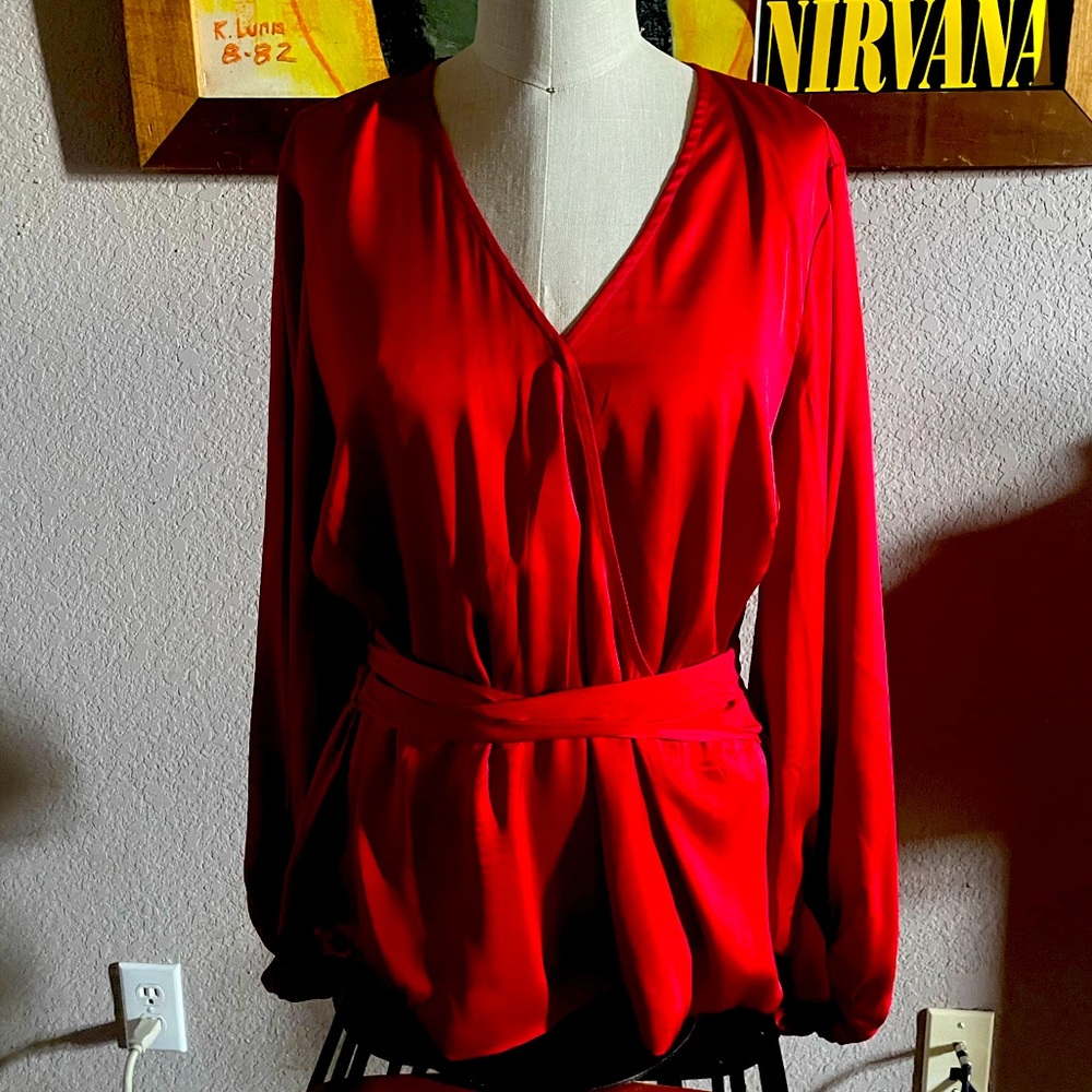 Pretty red blouse. Perfect for Christmas.